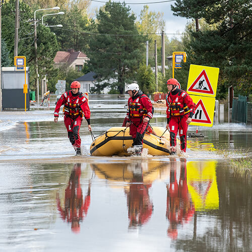 Rescue Workers in Flooded Area Assisting with Emergency Response