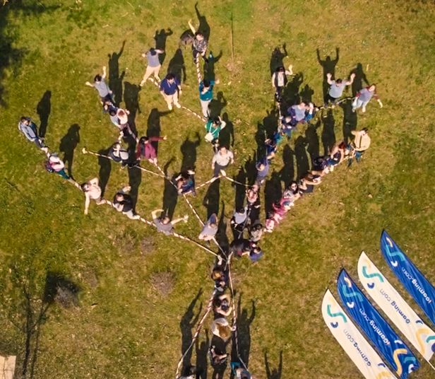 iGaming.com Employees and Children Celebrating Children’s Day in a Group Activity