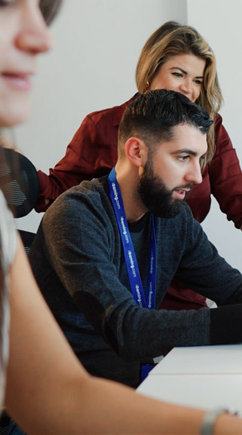 Three iGaming.com Colleagues Engaging in a Conversation