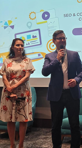 iGaming.com Chief Operating Officer Presenting at an SEO Conference with a Colleague